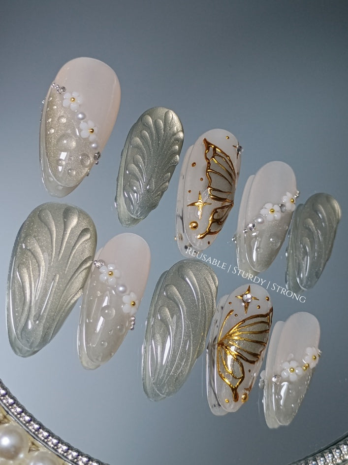 Ripple Effect Mirror With Golden Butterfly