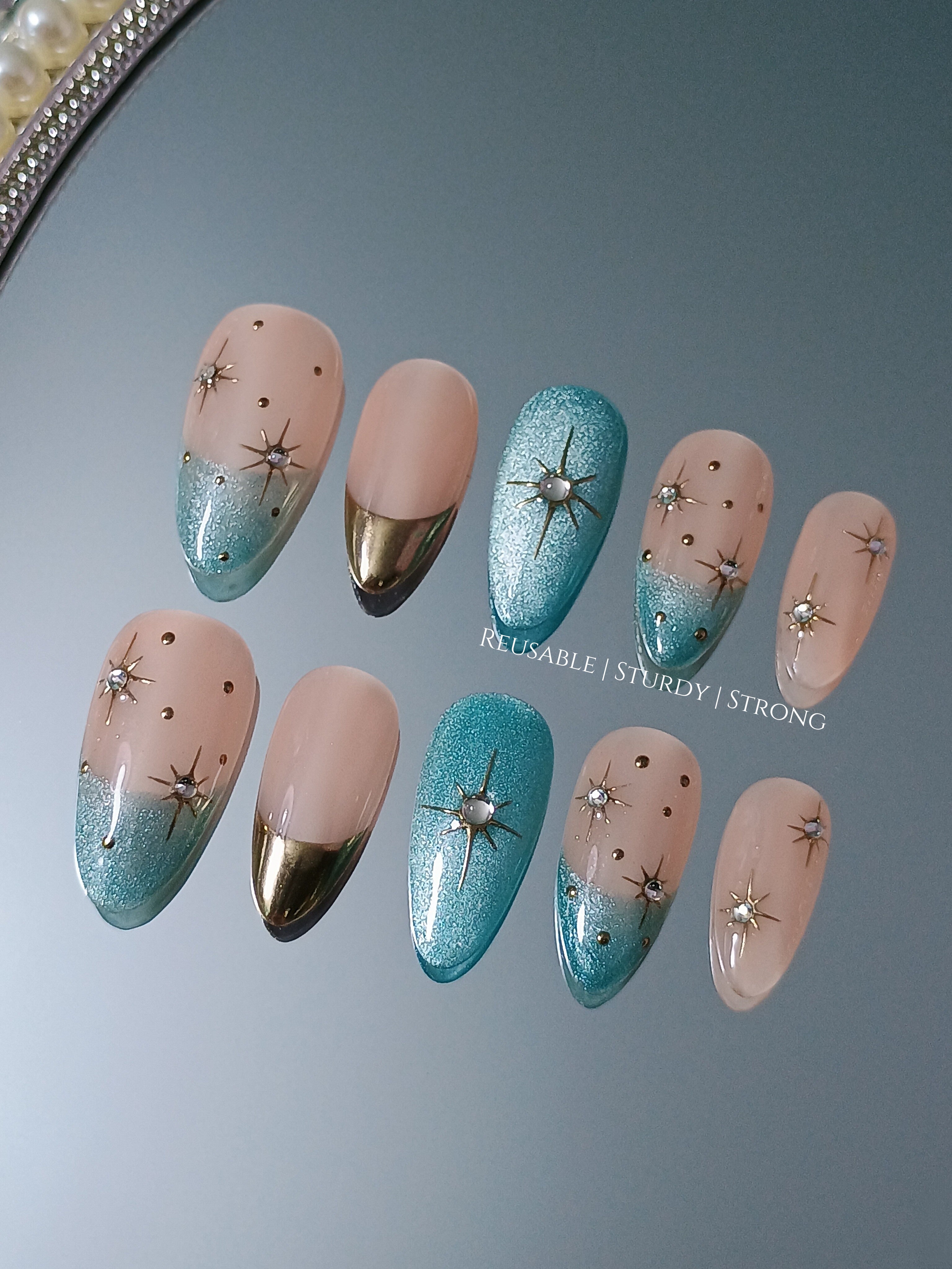 Galactic Radiance Gold & Teal French Nails, blue cat eye