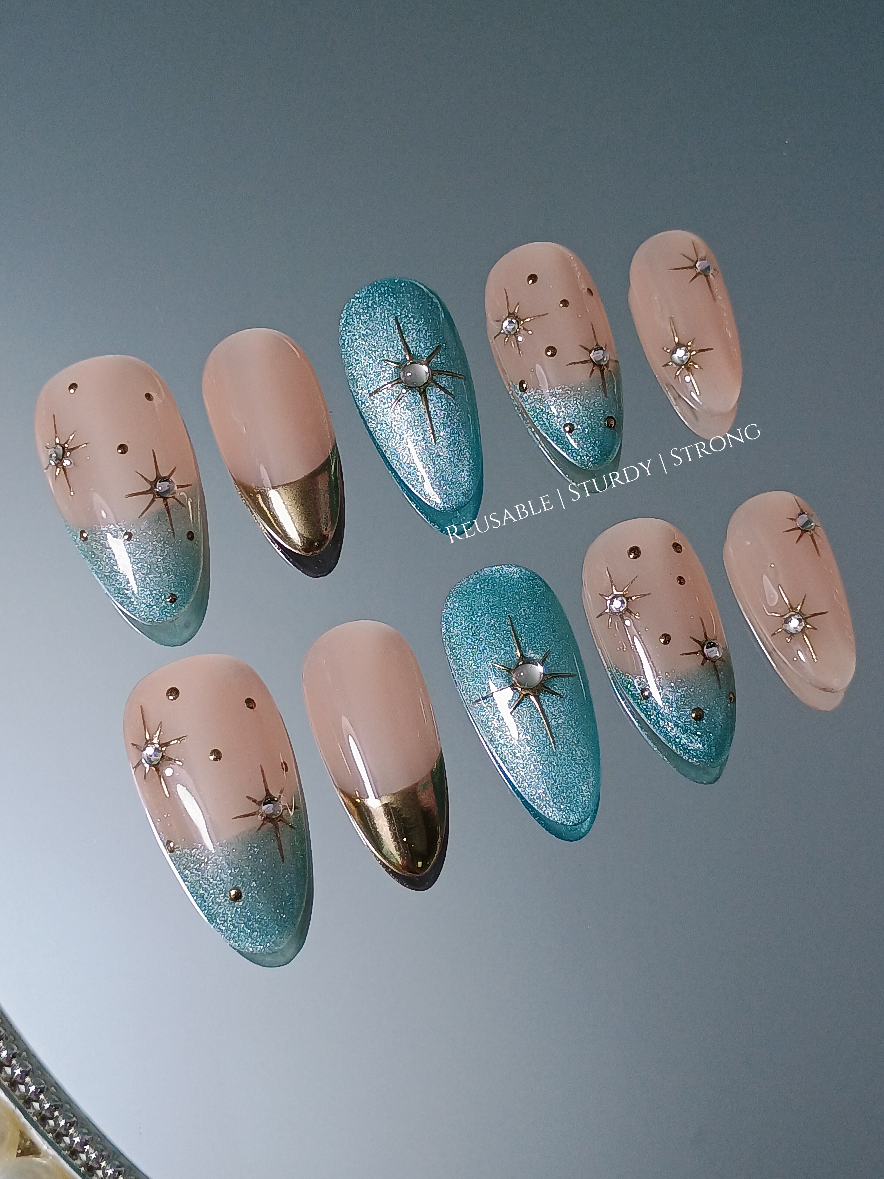 Galactic Radiance Gold & Teal French Nails, blue cat eye