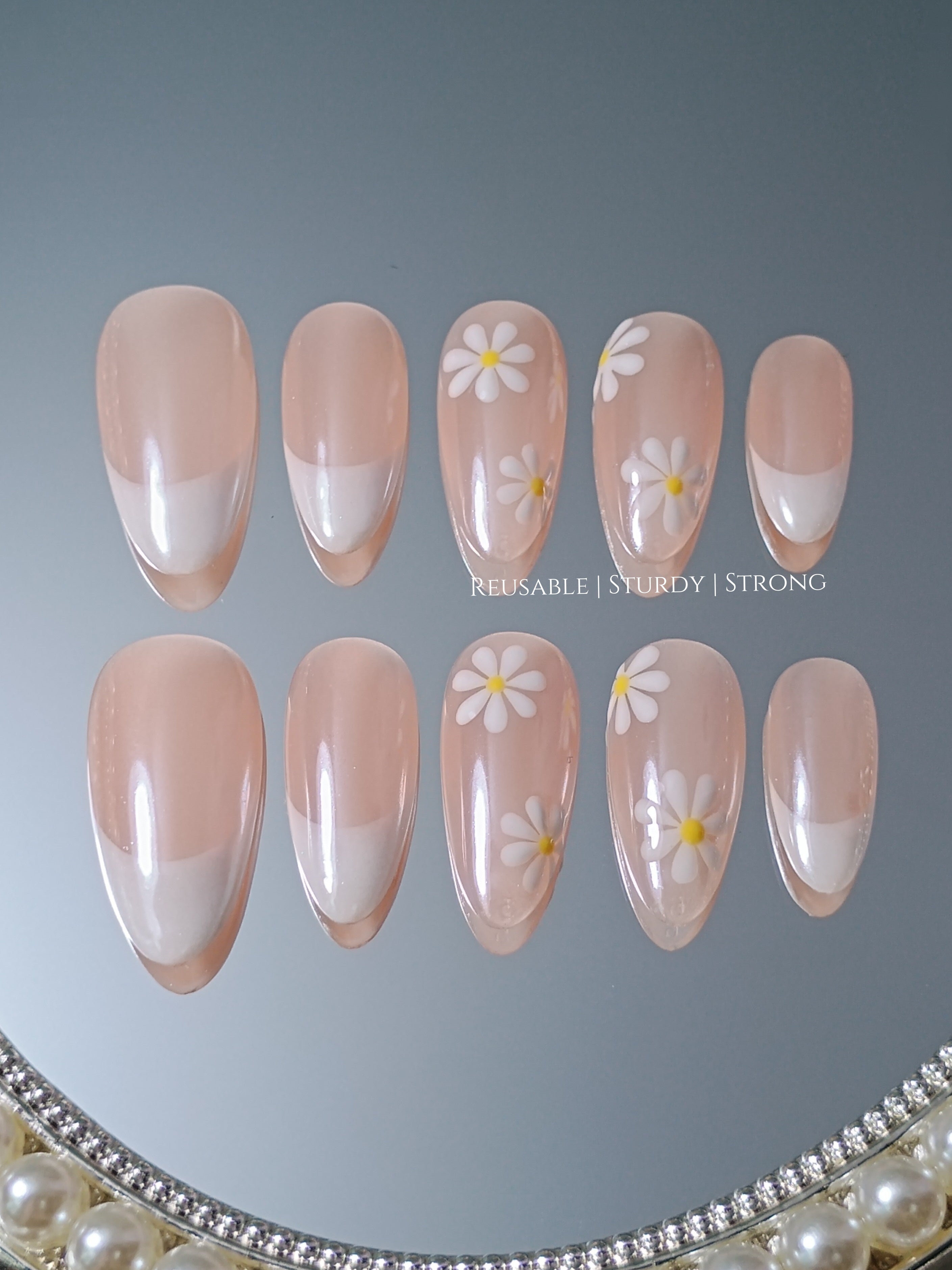 Dainty daisy donut glazed nail art