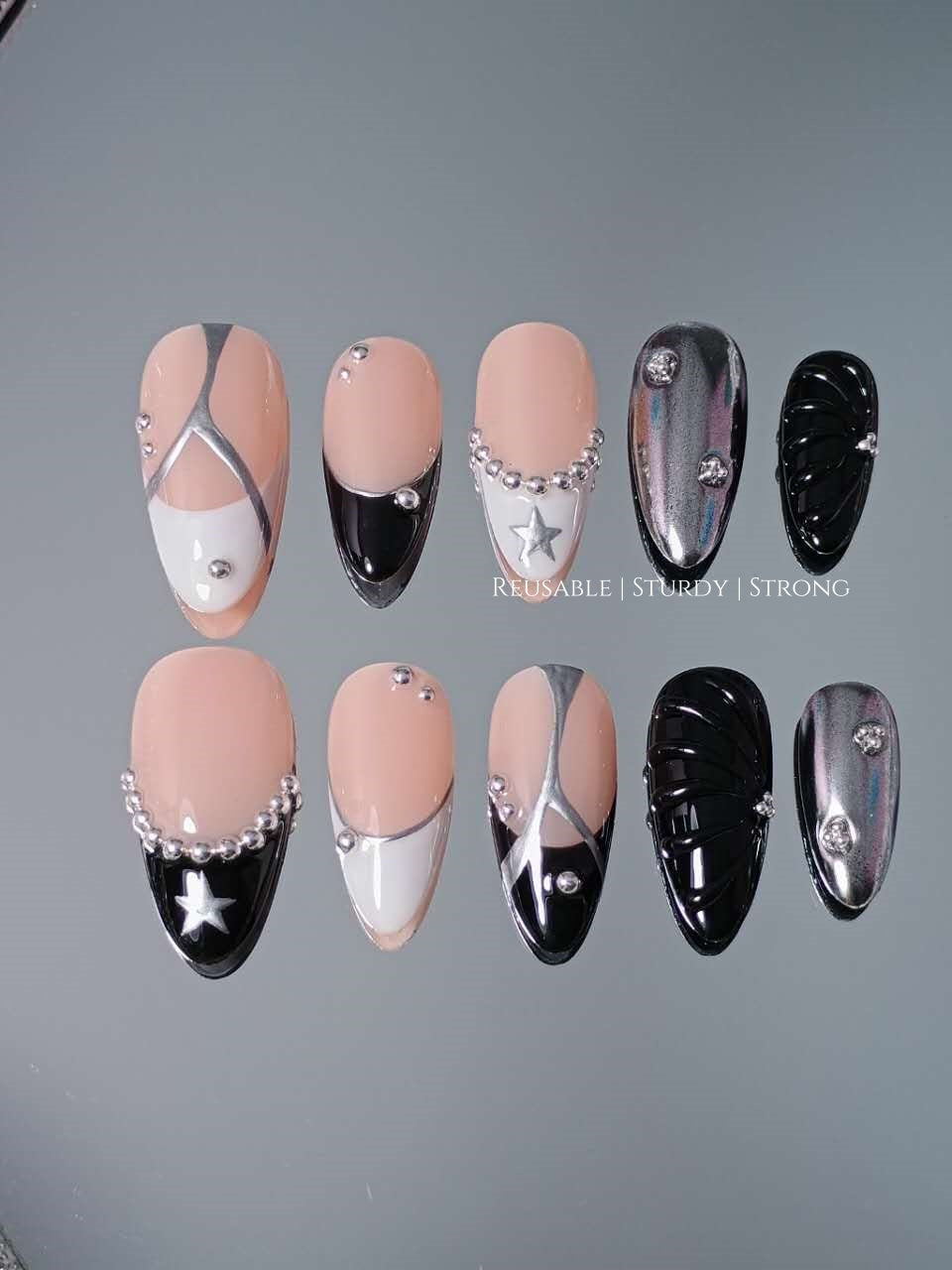 Cosmic Y2K Black White French Silver Star Nails
