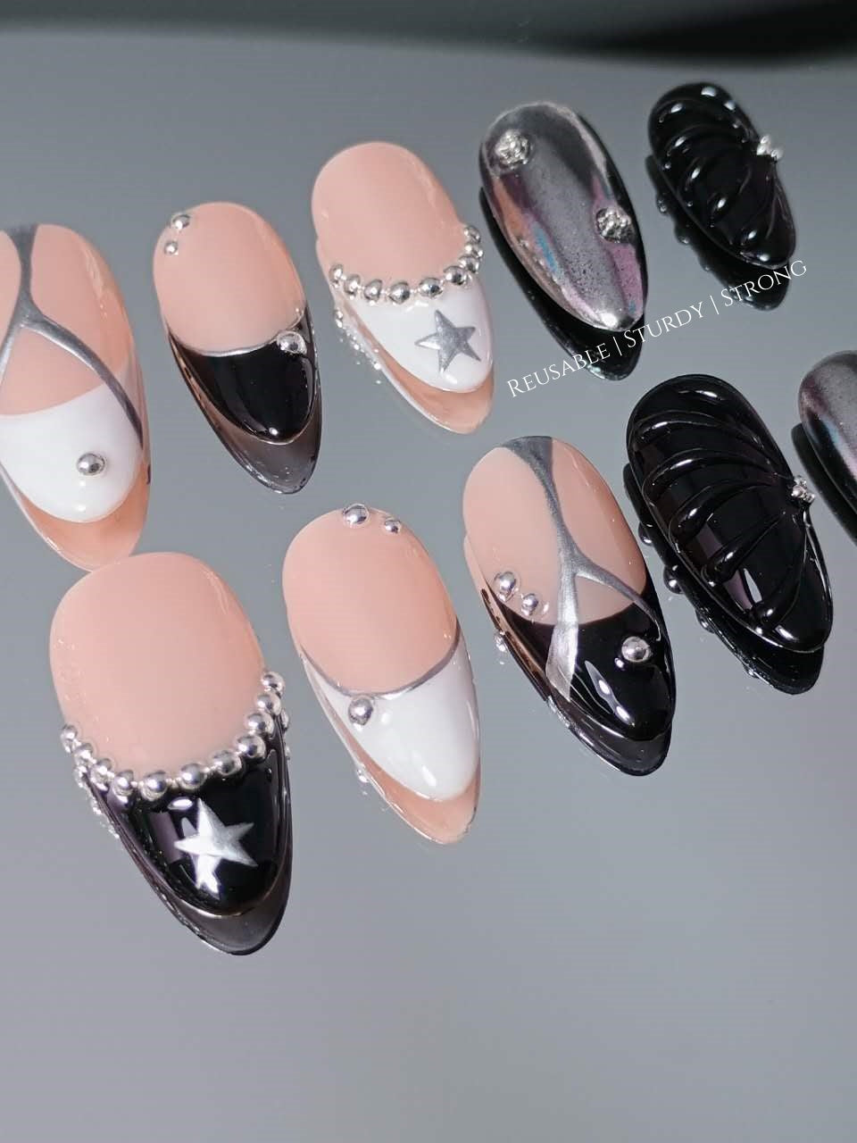 Cosmic Y2K Black White French Silver Star Nails