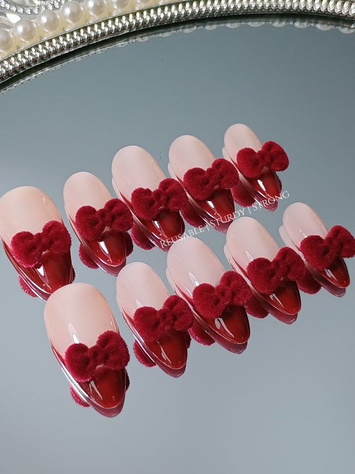 Cute Red Furry Bows On The Tips