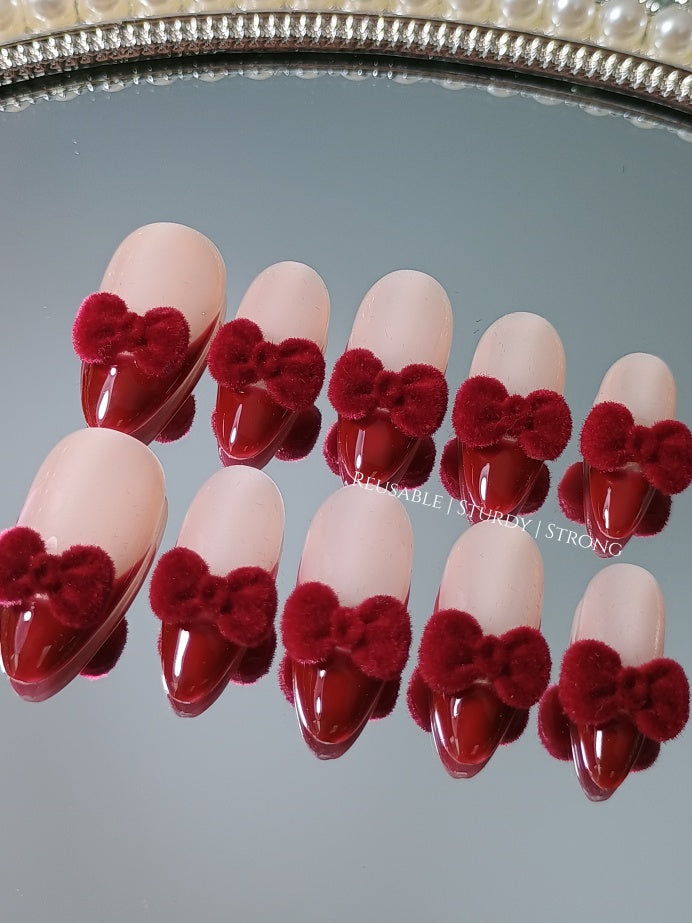 Cute Red Furry Bows On The Tips